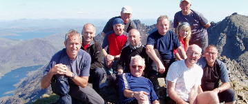 Members of a hillwalking club at the top of a mountain