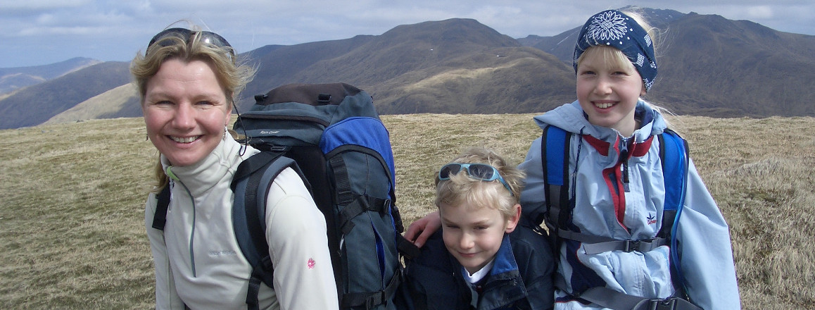 Mother and children hill walking in Scotland's mountains